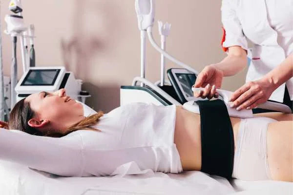 woman having body sculpting to help improve her body image and her mental health Stanford-le-Hope